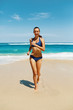 © puhhha - Beach Run. Fitness Woman Running On Sand. Beautiful Healthy Happy Smiling Girl With Sexy Fit Body In Sport Bikini Swimwear Having Fun On Summer Vacations Near Sea. Active Lifestyle, Recreation Concept