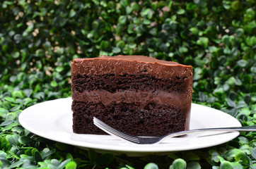 Delicious, soft sliced fresh homemade dark chocolate cake - side