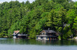Two boathouses on a lake in Muskoka, Ontario
