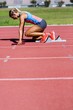 © WavebreakmediaMicro - Female athlete ready to start the relay race
