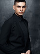 © cherry_d - Portrait of handsome man in a black suit.