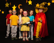 © Sergey Novikov - Six kids in stargazers costumes with telescope