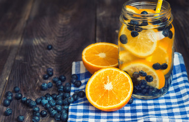 Canvas Print - Detox water with orange and blueberries in jar