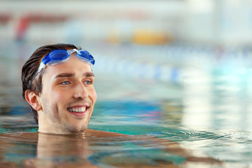 Canvas Print - Head of handsome man in the swimming pool