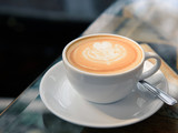 Fototapeta Mapy - coffee latte art on table