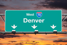 Denver Interstate 70 West Highway Sign With Sunrise Sky