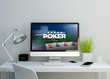 © MclittleStock - modern clean workspace with poker online website on screen