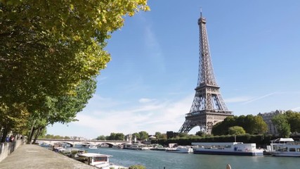 Wall Mural - Eiffel tower and Seine river in a sunny day in Paris, windy