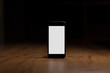 © Andriy Stefanyshyn - Mobile smart phone with blank screen on the table