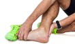 © WavebreakMediaMicro - Male athlete with foot pain on white background