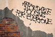 © M-SUR - Affordable Housing For Everyone - handwritten graffiti sprayed on the wall, anarchist aesthetics. Appeal to provide social housing for poor people. Prevention against homelessness
