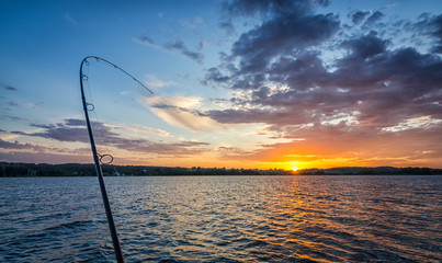 Wall Mural - Fishing at sunset