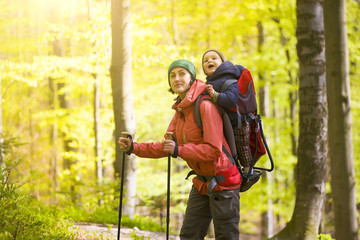 the mother and son are traveling.
