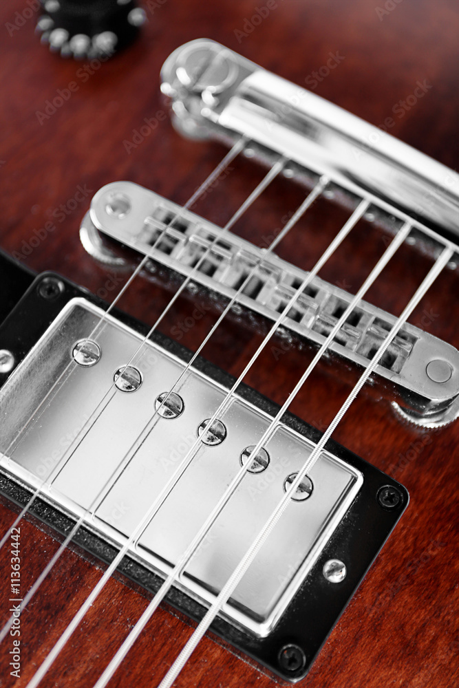 Strings of electric guitar, close up