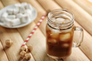 Poster - Jar of ice coffee on wooden table