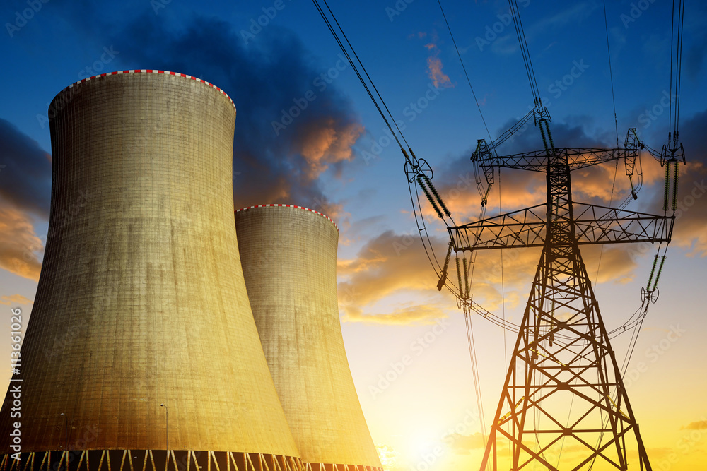 Nuclear power plant with high voltage tower at sunset Stock Photo ...