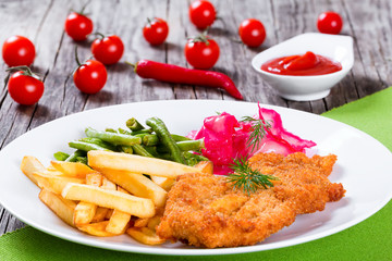 Poster - fried pork chop with french fries, green bean and salad