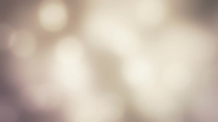 Abstract bokeh particles background. Seamless loop 