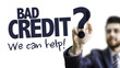 © gustavofrazao - Business Man Pointing the Text: Bad Credit? We Can Help!