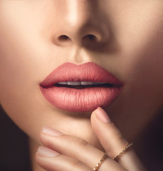 Wall Mural - Perfect woman's sensual lips with fashion natural beige matte lipstick makeup