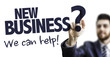 © gustavofrazao - Business Man Pointing the Text: New Business? We Can Help!