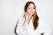 © Anetta - beautiful, happy young woman with flawless skin and long hair posing in bath robe