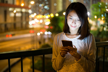 Poster - Woman use of mobile phone at night