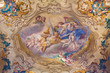 BRESCIA, ITALY - MAY 23, 2016: The of angels with the flowers on cupola of side chapel in church Chiesa di San Giovanni Evangelista by  Antonio Calegari from 18. cent.