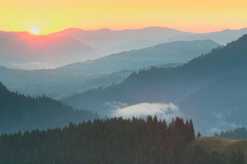 Wall Mural - mountains range - sunrise with real sun