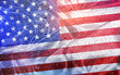 American flag with water drops and sunlight, patriotic background