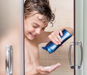 Teen boy in bathroom