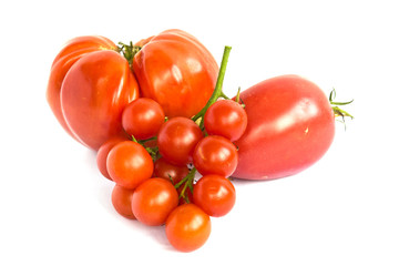 Various kinds of tomatoes isolated on white background