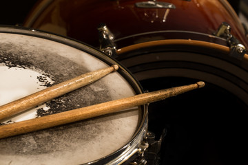 working drum with drum sticks, musical instrument