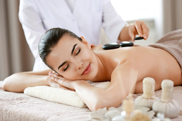 Poster - Young woman having spa procedures at the beauty salon