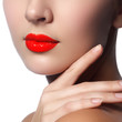 © looking2thesky - Close-up shot of woman lips with glossy red lipstick