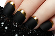 Black matte nail polish. Manicured nail with black matte nail polish