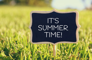 Wall Mural - Wooden chalkboard sign with quote: IT'S SUMMER TIME