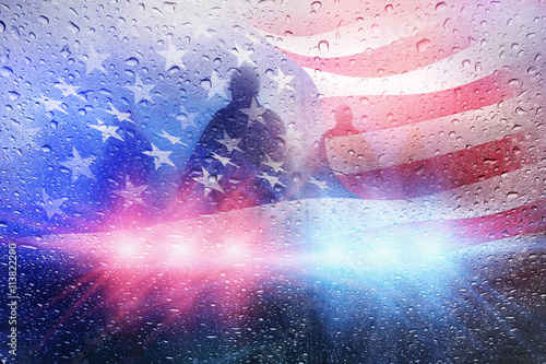 Cuadros en Lienzo Police crime scene, rain background with police lights and american flag