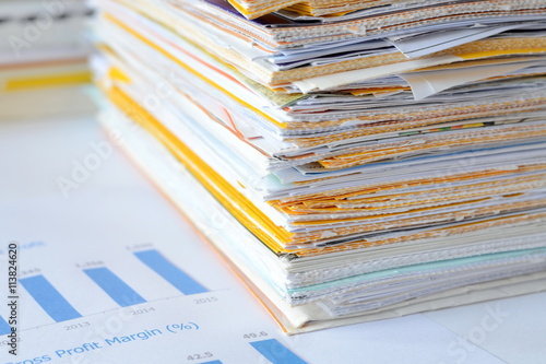 Fotografía Stack of documents at business office,financial reports and statements,high key tone