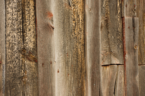 Wooden Siding With Noted Wood And Old Red Paint From Historical