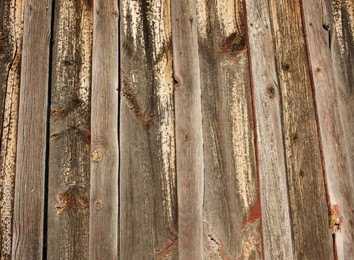 Wooden Siding With Noted Wood And Old Red Paint From Historical