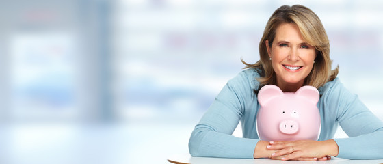 Sticker - Senior woman with a piggy bank.