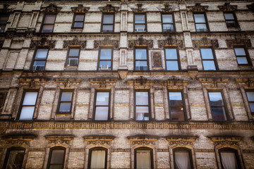 Typical exterior facade of old New York City apartment buildings