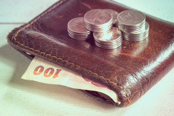 save money for investment concept money in leather wallet with filter effect retro vintage style