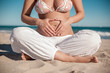 © detailblick-foto - Schwangere frau am Strand