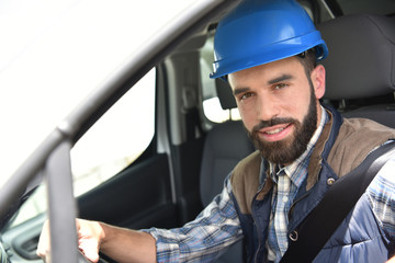 Wall Mural - Technician sitting in vehicle