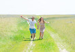 © Irina84 - loving couple are fling kite on a meadow