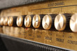 detail of controll panel of an guitar amplifier