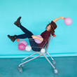 © kegfire - smiling fashion brunette girl sitting in shopping cart