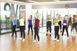 © Prostock-studio - Group of young women in the fitness class